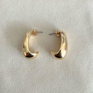 New Gold teardrop hoop earrings.